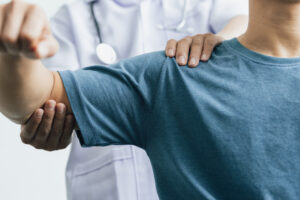 Doctor working on shoulder pain