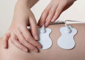 e-stim on the back of a person